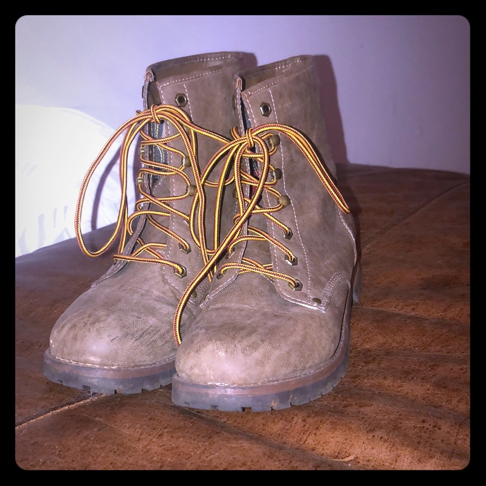 Brown lace up boots with plaid lining